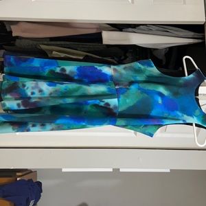 Blue green dress that is stretchy with silver zip